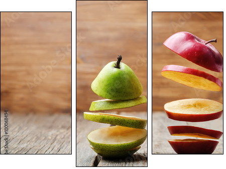 flying slices of fruit: apple, pear - Three-piece canvas print, Triptych