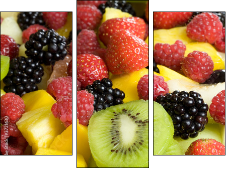 Delicious fruit salad served in a bowl - Three-piece canvas print, Triptych
