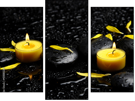 Spa concept-two candle with yellow flower petals on pebbles - Three-piece canvas print, Triptych