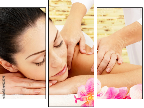 Woman having massage of shoulder in spa salon - Three-piece canvas print, Triptych
