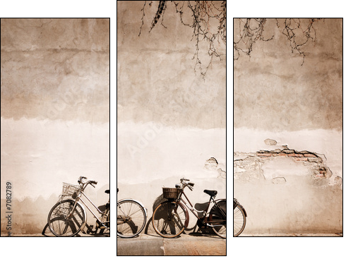Italian old-style bicycles leaning against a wall  - Three-piece canvas print, Triptych