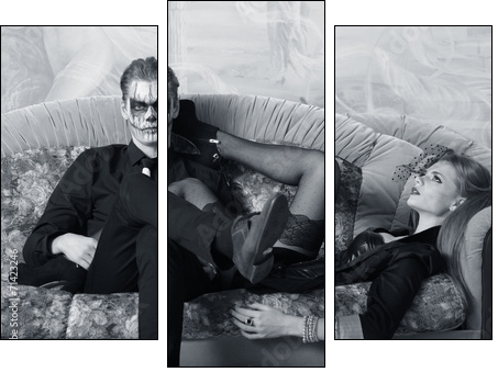 young man and woman on the sofa. makeup in Halloween theme - Three-piece canvas print, Triptych