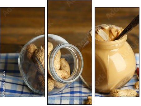 Fresh peanut butter in jar on wooden background - Three-piece canvas print, Triptych