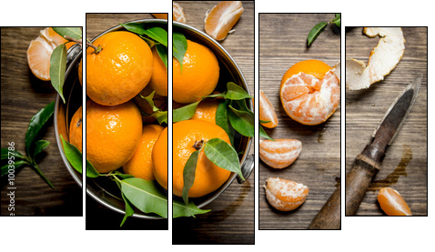 Fresh tangerines with a knife and peeled mandarins in the bucket. - Five-piece canvas print, Pentaptych