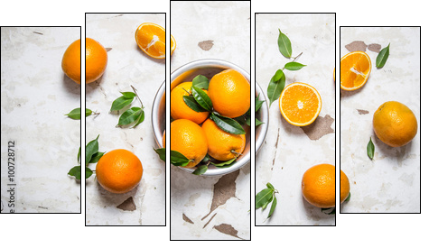 Orange style. Fresh oranges with leaves in a Cup . - Five-piece canvas print, Pentaptych
