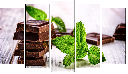 A few cubes of black chocolate with mint leaves on wooden table - Five-piece canvas print, Pentaptych