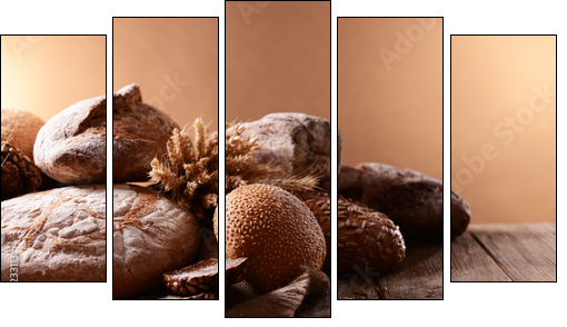 Different bread on table on brown background - Five-piece canvas print, Pentaptych